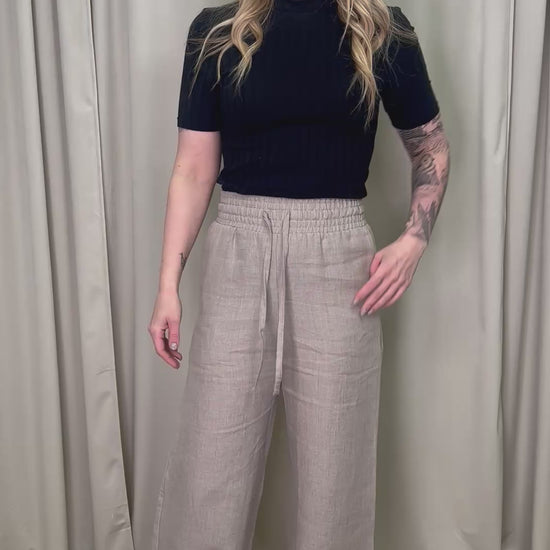 Leuto pellavahousut hiekka esittelyvideo